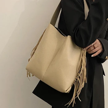 Нишевая дизайнерская сумка женская 2022 Осень/зима Новая сумка через плечо 2в1 сумка-мешок с кисточками